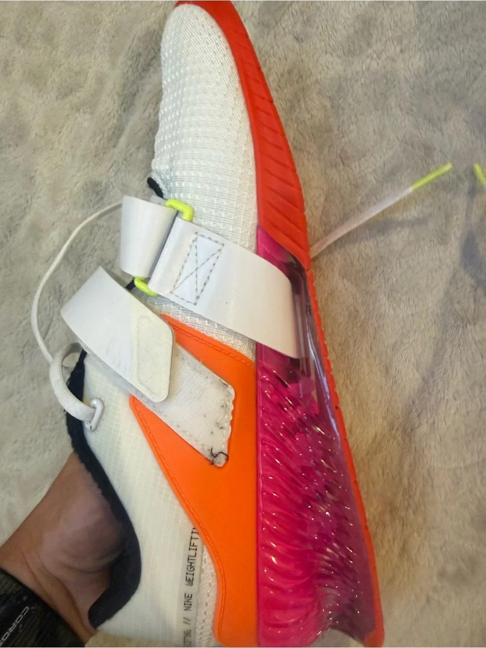 Nike White Athletic Shoes with Black Swoosh and Red Sole